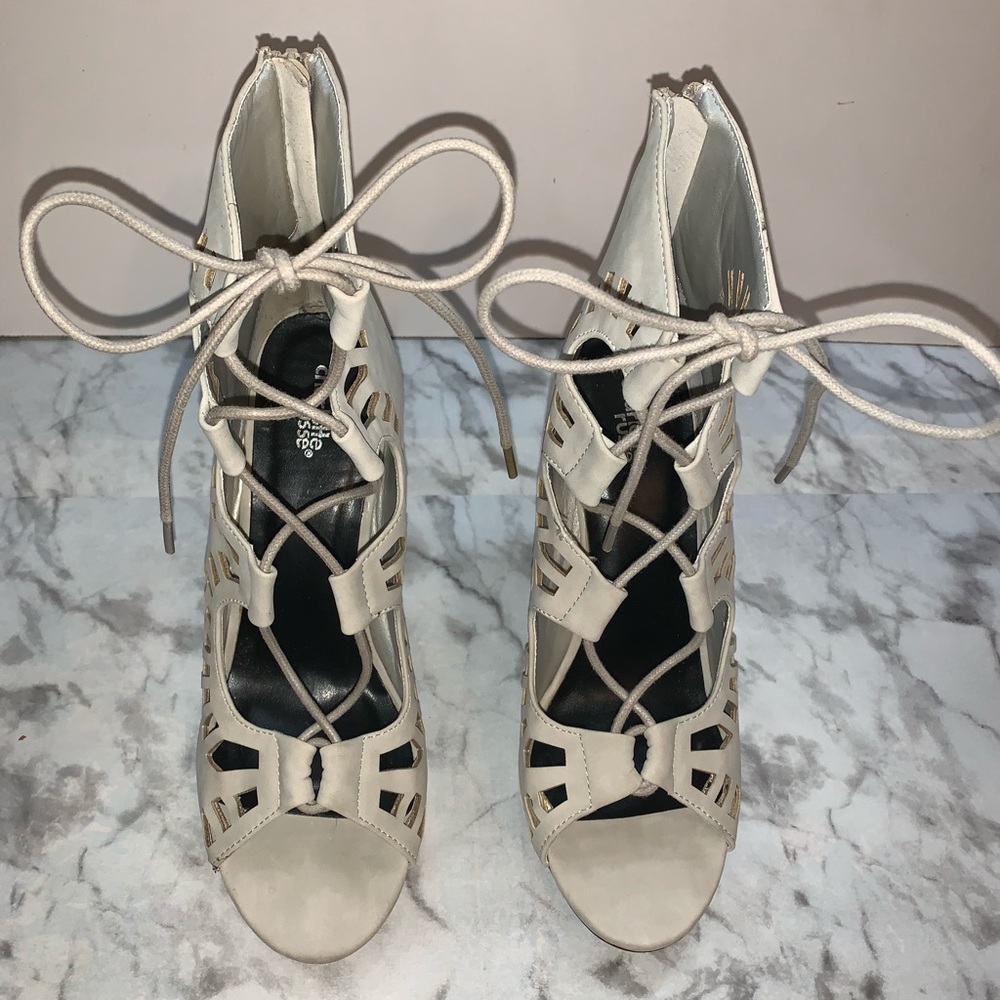 Nude, 4.5 inch, lace up heels.